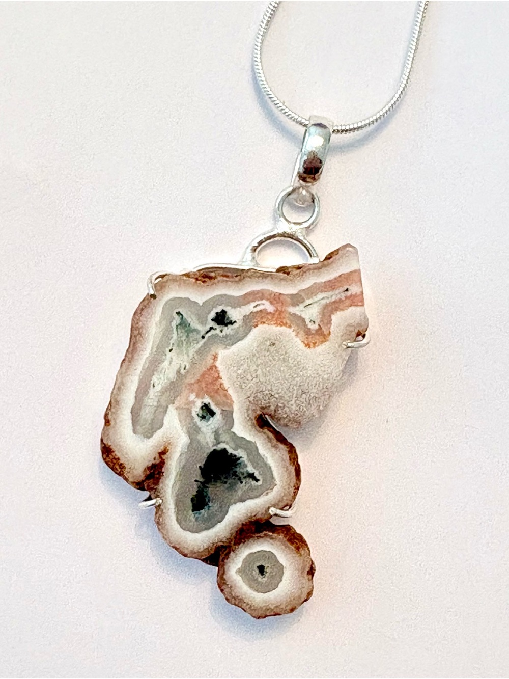 2 inch, natural edges, Tree Agate in Solar Slice pendant on a silver chain.